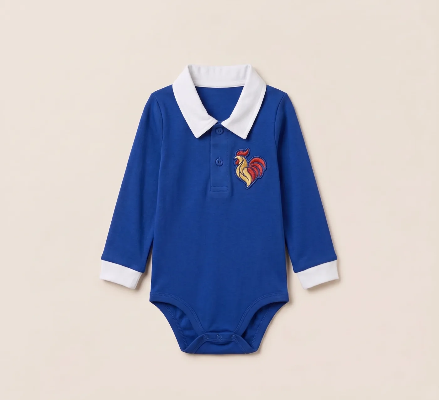 France baby rugby romper in royal blue with a white collar and cockerel crest